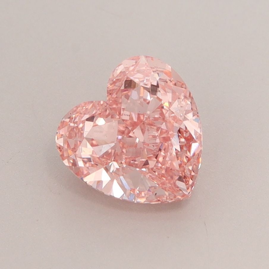 Loose Diamond - HEART 1.52ct Fancy Vivid Pink VS2: Loose Diamond - HEART 1.52ct Fancy Vivid Pink VS2 Source: This is a real non-mined Diamond that has been grown in a lab Shape: HEART Carats: 1.52 Color: Fancy Vivid Pink Certification: IGI Video: