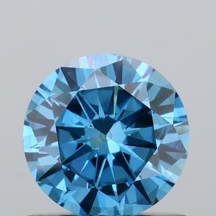 Loose Diamond - ROUND 0.66ct Fancy Vivid Blue VS2: Loose Diamond - ROUND 0.66ct Fancy Vivid Blue VS2 Source: This is a real non-mined Diamond that has been grown in a lab Shape: ROUND Carats: 0.66 Color: Fancy Vivid Blue Certification: IGI Video: