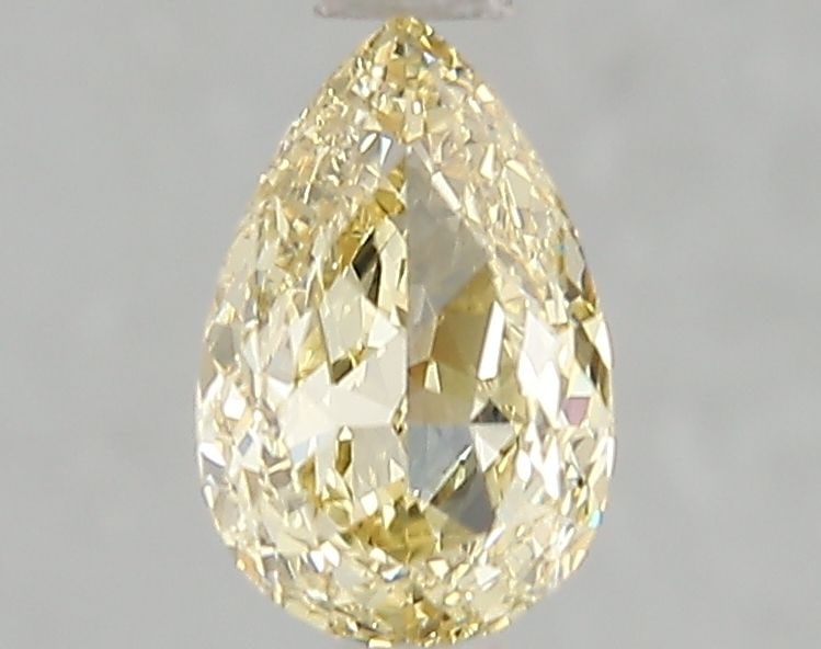 Loose Diamond - PEAR 1.04ct Fancy Yellow VVS2: Loose Diamond - PEAR 1.04ct Fancy Yellow VVS2 Source: This is a real non-mined Diamond that has been grown in a lab Shape: PEAR Carats: 1.04 Color: Fancy Yellow Certification: IGI Video: