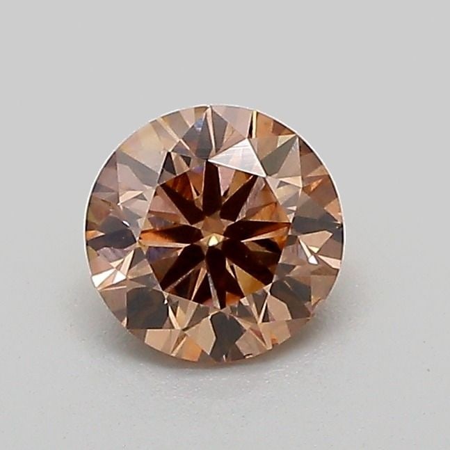 Loose Diamond - ROUND 0.55ct Fancy Light Brown VS1: Loose Diamond - ROUND 0.55ct Fancy Light Brown VS1 Source: This is a real non-mined Diamond that has been grown in a lab Shape: ROUND Carats: 0.55 Color: Fancy Light Brown Certification: IGI Video: