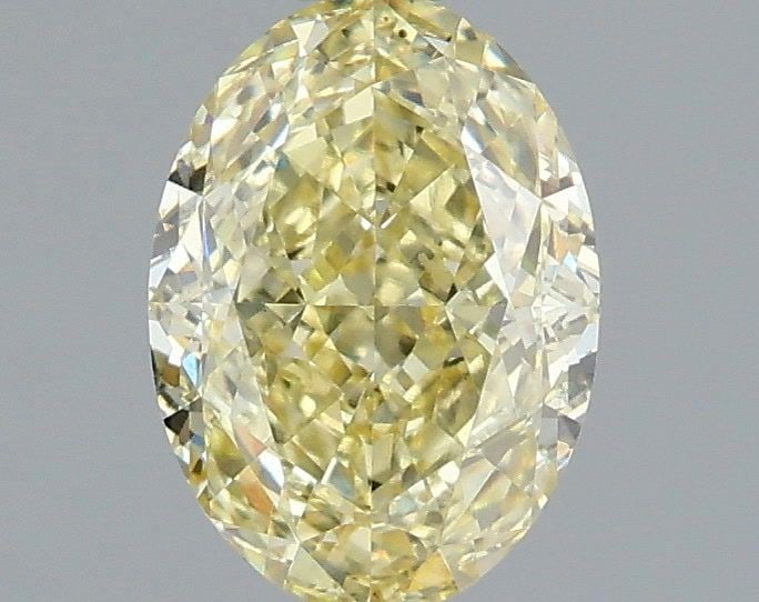 Loose Diamond - OVAL 1.59ct Fancy Yellow VS1: Loose Diamond - OVAL 1.59ct Fancy Yellow VS1 Source: This is a real non-mined Diamond that has been grown in a lab Shape: OVAL Carats: 1.59 Color: Fancy Yellow Certification: IGI Video: