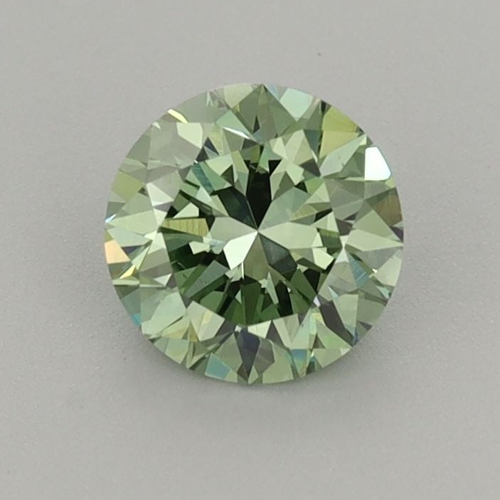Loose Diamond - ROUND 0.71ct Fancy Vivid Green VS1: Loose Diamond - ROUND 0.71ct Fancy Vivid Green VS1 Source: This is a real non-mined Diamond that has been grown in a lab Shape: ROUND Carats: 0.71 Color: Fancy Vivid Green Certification: IGI Video: