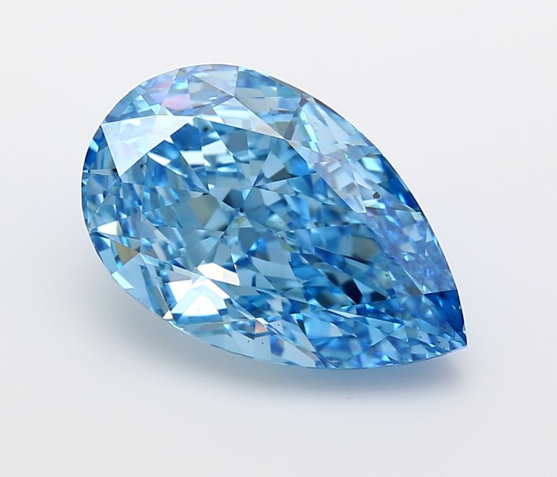 Loose Diamond - PEAR 7.06ct Fancy Vivid Blue VS2: Loose Diamond - PEAR 7.06ct Fancy Vivid Blue VS2 Source: This is a real non-mined Diamond that has been grown in a lab Shape: PEAR Carats: 7.06 Color: Fancy Vivid Blue Certification: IGI Video: