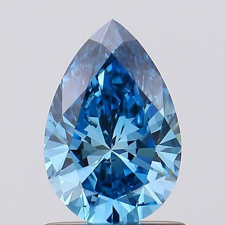Loose Diamond - PEAR 0.9ct Fancy Vivid Blue VS2: Loose Diamond - PEAR 0.9ct Fancy Vivid Blue VS2 Source: This is a real non-mined Diamond that has been grown in a lab Shape: PEAR Carats: 0.9 Color: Fancy Vivid Blue Certification: IGI Video: