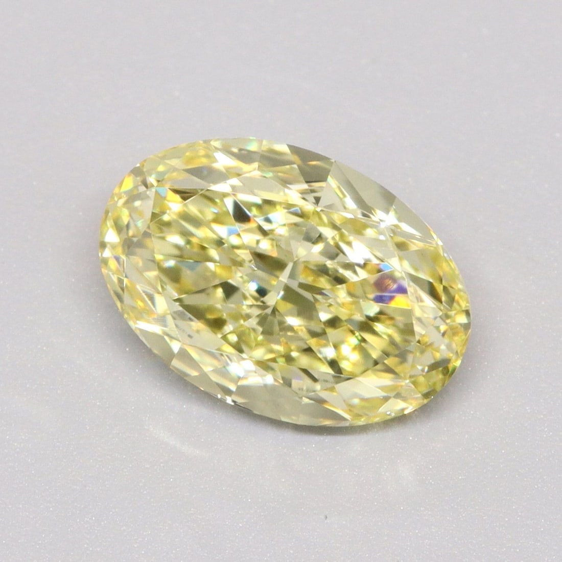 Loose Diamond - OVAL 1.52ct Fancy Intense Yellow VVS2: Loose Diamond - OVAL 1.52ct Fancy Intense Yellow VVS2 Source: This is a real non-mined Diamond that has been grown in a lab Shape: OVAL Carats: 1.52 Color: Fancy Intense Yellow Certification: IGI Vide