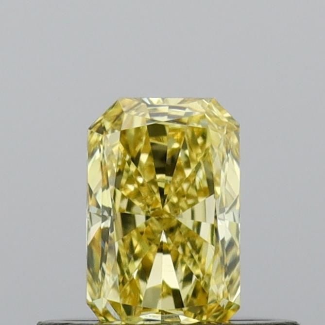 Loose Diamond - RADIANT 0.38ct Fancy Vivid Yellow VS1: Loose Diamond - RADIANT 0.38ct Fancy Vivid Yellow VS1 Source: This is a real non-mined Diamond that has been grown in a lab Shape: RADIANT Carats: 0.38 Color: Fancy Vivid Yellow Certification: IGI Vid