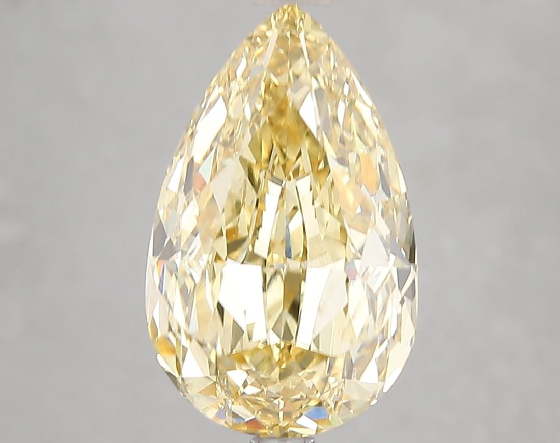 Loose Diamond - PEAR 5.12ct Fancy Vivid Yellow VS1: Loose Diamond - PEAR 5.12ct Fancy Vivid Yellow VS1 Source: This is a real non-mined Diamond that has been grown in a lab Shape: PEAR Carats: 5.12 Color: Fancy Vivid Yellow Certification: IGI Video: