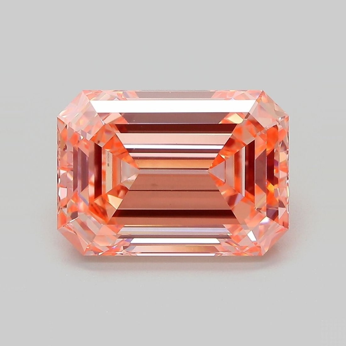 Loose Diamond - EMERALD 6.1ct Fancy Vivid Orange Pink VS1: Loose Diamond - EMERALD 6.1ct Fancy Vivid Orange Pink VS1 Source: This is a real non-mined Diamond that has been grown in a lab Shape: EMERALD Carats: 6.1 Color: Fancy Vivid Orange Pink Certification: