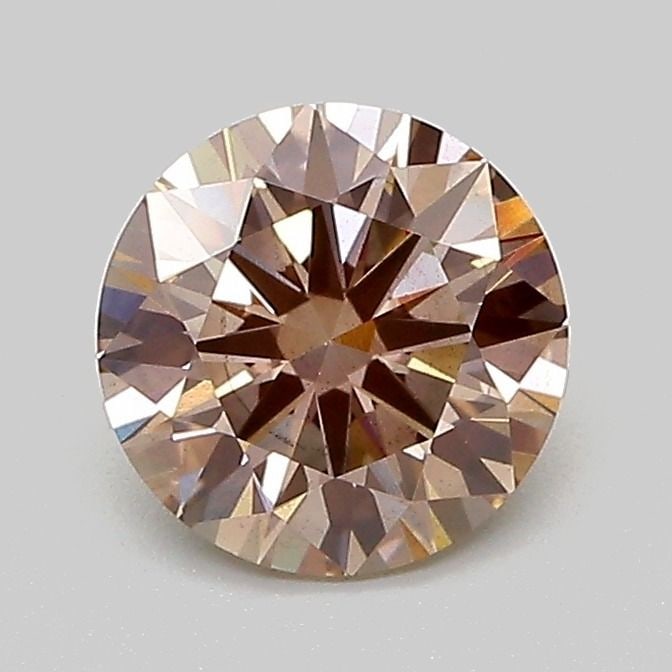 Ideal Loose Diamond - ROUND 1.1ct Fancy Light Pinkish Brown SI1: Ideal Loose Diamond - ROUND 1.1ct Fancy Light Pinkish Brown SI1 Source: This is a real non-mined Diamond that has been grown in a lab Shape: ROUND Carats: 1.1 Color: Fancy Light Pinkish Brown Certific