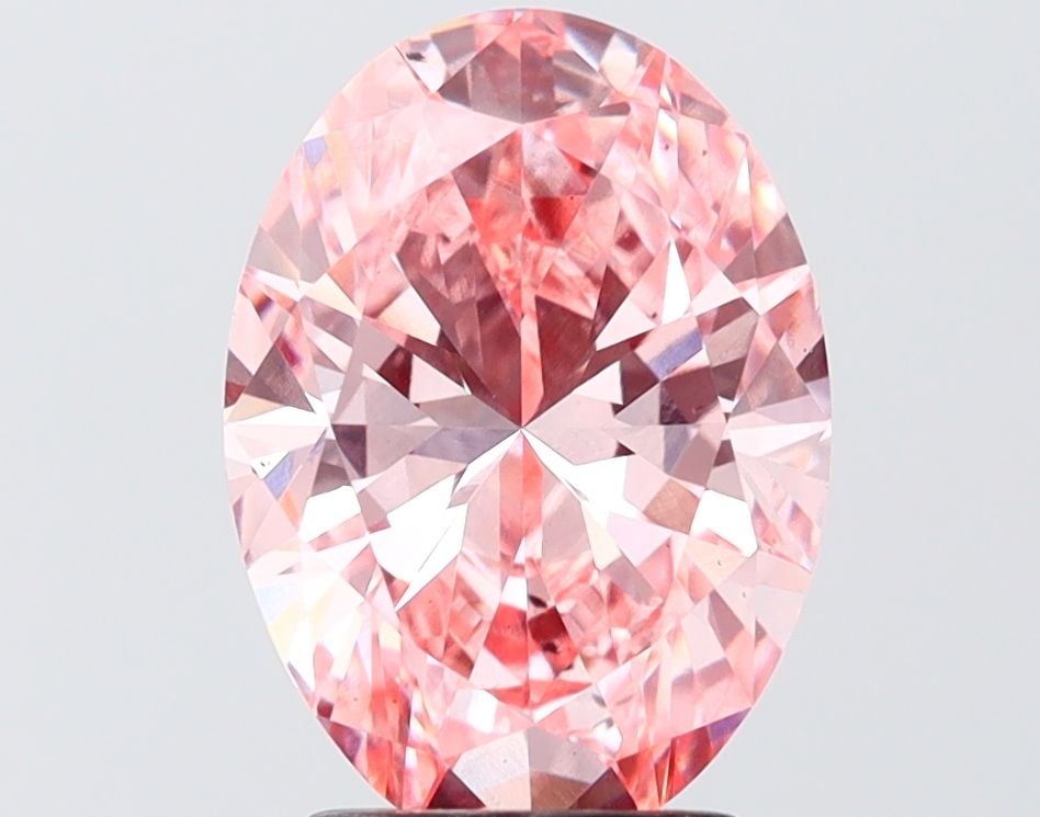 Loose Diamond - OVAL 3.0ct Fancy Vivid Pink VS2: Loose Diamond - OVAL 3.0ct Fancy Vivid Pink VS2 Source: This is a real non-mined Diamond that has been grown in a lab Shape: OVAL Carats: 3.0 Color: Fancy Vivid Pink Certification: IGI Video: