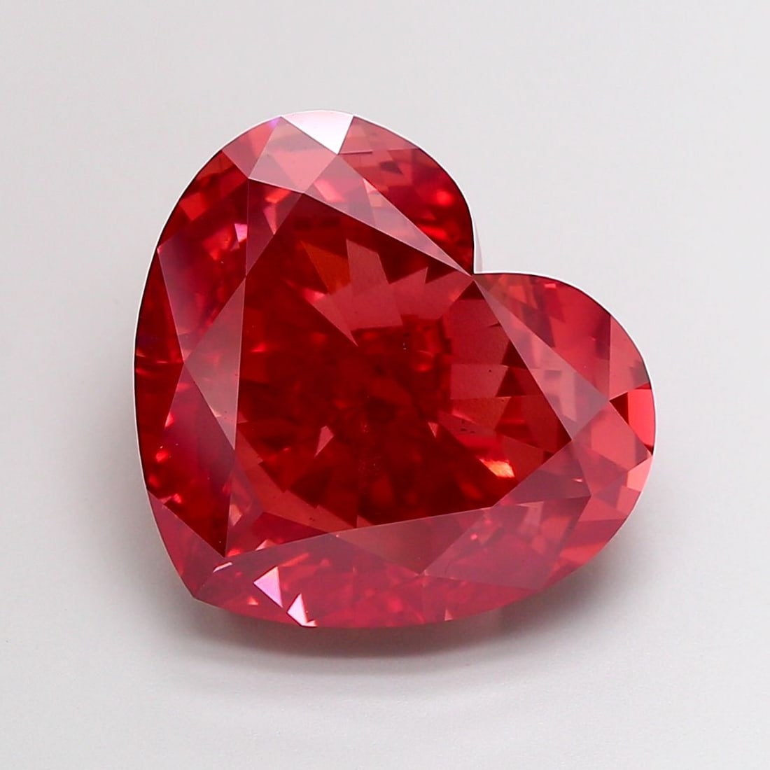 Loose Diamond - HEART 15.22ct Fancy Vivid Pink VS2: Loose Diamond - HEART 15.22ct Fancy Vivid Pink VS2 Source: This is a real non-mined Diamond that has been grown in a lab Shape: HEART Carats: 15.22 Color: Fancy Vivid Pink Certification: IGI Video: