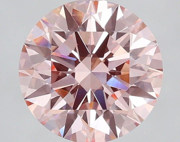 Ideal Loose Diamond - ROUND 2.05ct Fancy Vivid Pink VS1: Ideal Loose Diamond - ROUND 2.05ct Fancy Vivid Pink VS1 Source: This is a real non-mined Diamond that has been grown in a lab Shape: ROUND Carats: 2.05 Color: Fancy Vivid Pink Certification: IGI Video