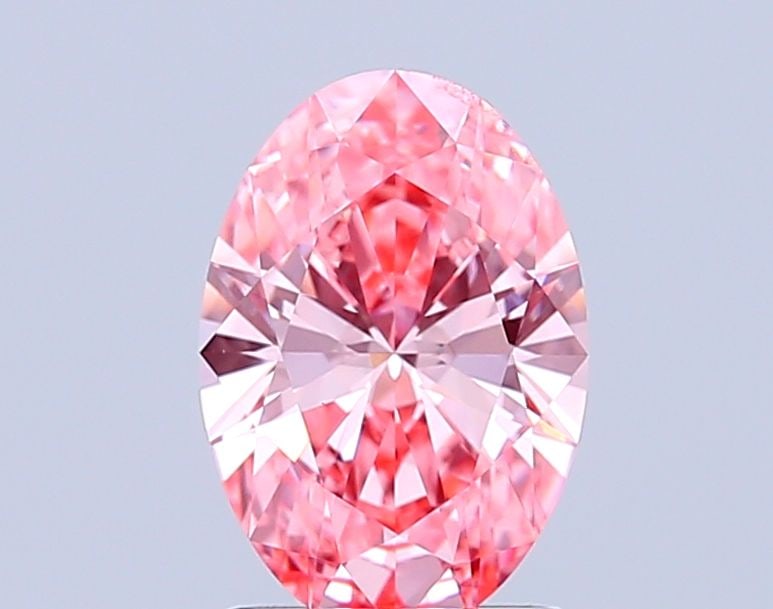 Loose Diamond - OVAL 1.58ct Fancy Vivid Pink VVS2: Loose Diamond - OVAL 1.58ct Fancy Vivid Pink VVS2 Source: This is a real non-mined Diamond that has been grown in a lab Shape: OVAL Carats: 1.58 Color: Fancy Vivid Pink Certification: IGI Video: