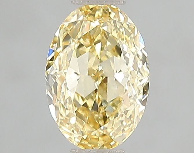 Loose Diamond - OVAL 1.01ct Fancy Intense Yellow VS2: Loose Diamond - OVAL 1.01ct Fancy Intense Yellow VS2 Source: This is a real non-mined Diamond that has been grown in a lab Shape: OVAL Carats: 1.01 Color: Fancy Intense Yellow Certification: IGI Video
