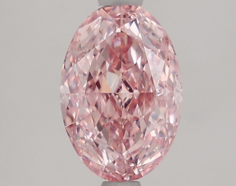 Loose Diamond - OVAL 1.74ct Fancy Vivid Pink VS1: Loose Diamond - OVAL 1.74ct Fancy Vivid Pink VS1 Source: This is a real non-mined Diamond that has been grown in a lab Shape: OVAL Carats: 1.74 Color: Fancy Vivid Pink Certification: IGI Video: