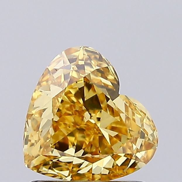 Loose Diamond - HEART 1.0ct Fancy Vivid Yellow VS1: Loose Diamond - HEART 1.0ct Fancy Vivid Yellow VS1 Source: This is a real non-mined Diamond that has been grown in a lab Shape: HEART Carats: 1.0 Color: Fancy Vivid Yellow Certification: IGI Video: