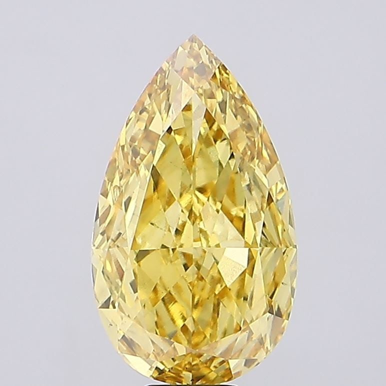 Loose Diamond - PEAR 13.68ct Fancy Vivid Yellow VS1: Loose Diamond - PEAR 13.68ct Fancy Vivid Yellow VS1 Source: This is a real non-mined Diamond that has been grown in a lab Shape: PEAR Carats: 13.68 Color: Fancy Vivid Yellow Certification: IGI The Dia