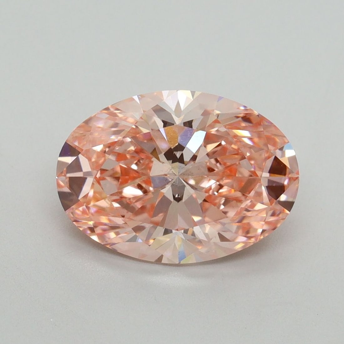 Loose Diamond - OVAL 3.02ct Fancy Vivid Pink VS2: Loose Diamond - OVAL 3.02ct Fancy Vivid Pink VS2 Source: This is a real non-mined Diamond that has been grown in a lab Shape: OVAL Carats: 3.02 Color: Fancy Vivid Pink Certification: IGI Video: