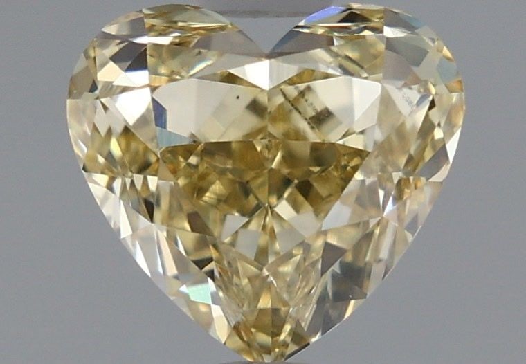 Loose Diamond - HEART 1.35ct Fancy Intense Yellow VS1: Loose Diamond - HEART 1.35ct Fancy Intense Yellow VS1 Source: This is a real non-mined Diamond that has been grown in a lab Shape: HEART Carats: 1.35 Color: Fancy Intense Yellow Certification: IGI Vid