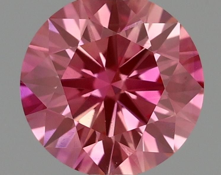 Ideal Loose Diamond - ROUND 0.54ct Fancy Vivid Pink VVS1: Ideal Loose Diamond - ROUND 0.54ct Fancy Vivid Pink VVS1 Source: This is a real non-mined Diamond that has been grown in a lab Shape: ROUND Carats: 0.54 Color: Fancy Vivid Pink Certification: IGI Vide