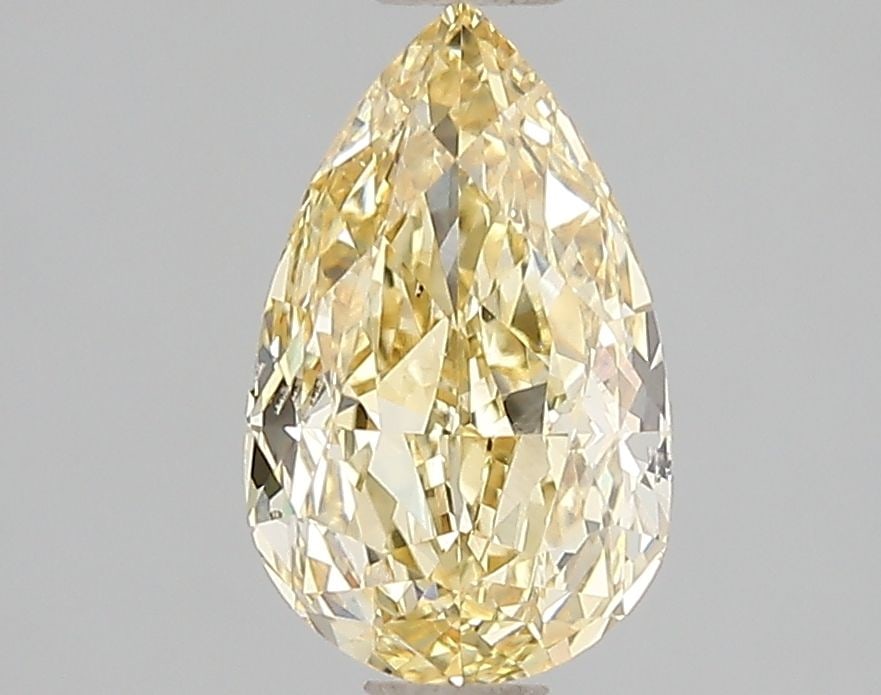 Loose Diamond - PEAR 1.51ct Fancy Vivid Yellow VS2: Loose Diamond - PEAR 1.51ct Fancy Vivid Yellow VS2 Source: This is a real non-mined Diamond that has been grown in a lab Shape: PEAR Carats: 1.51 Color: Fancy Vivid Yellow Certification: IGI Video: