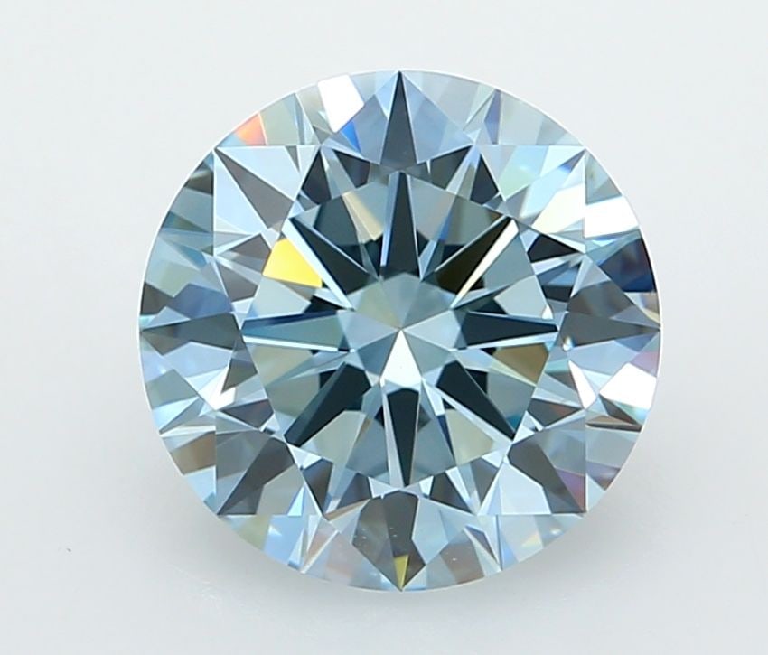 Ideal Loose Diamond - ROUND 3.01ct Fancy Vivid Blue VVS2: Ideal Loose Diamond - ROUND 3.01ct Fancy Vivid Blue VVS2 Source: This is a real non-mined Diamond that has been grown in a lab Shape: ROUND Carats: 3.01 Color: Fancy Vivid Blue Certification: IGI Vide