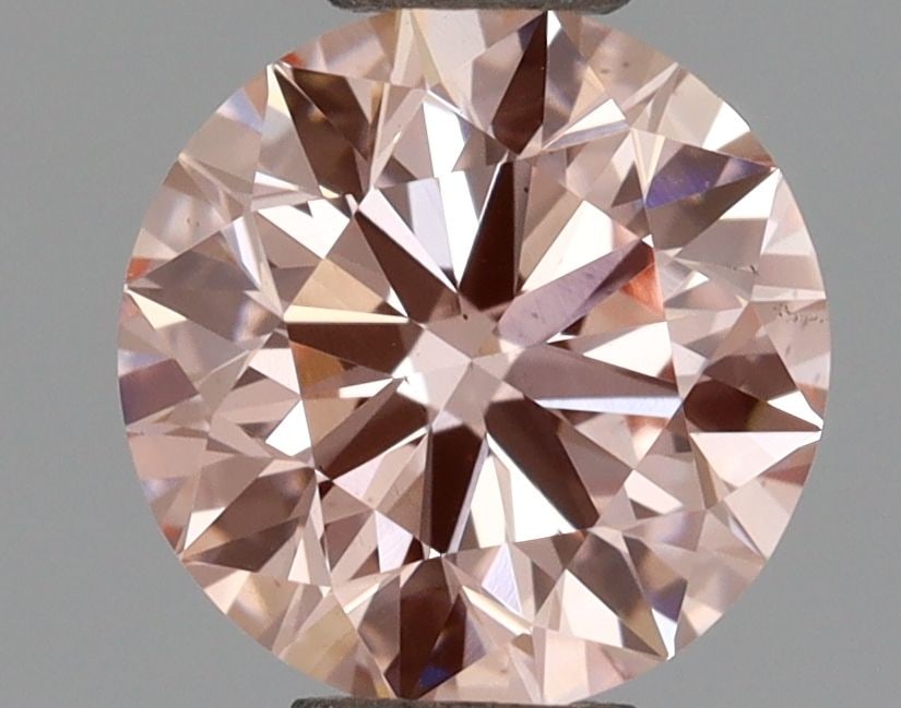 Ideal Loose Diamond - ROUND 0.97ct Fancy Intense Pink VS2: Ideal Loose Diamond - ROUND 0.97ct Fancy Intense Pink VS2 Source: This is a real non-mined Diamond that has been grown in a lab Shape: ROUND Carats: 0.97 Color: Fancy Intense Pink Certification: IGI V