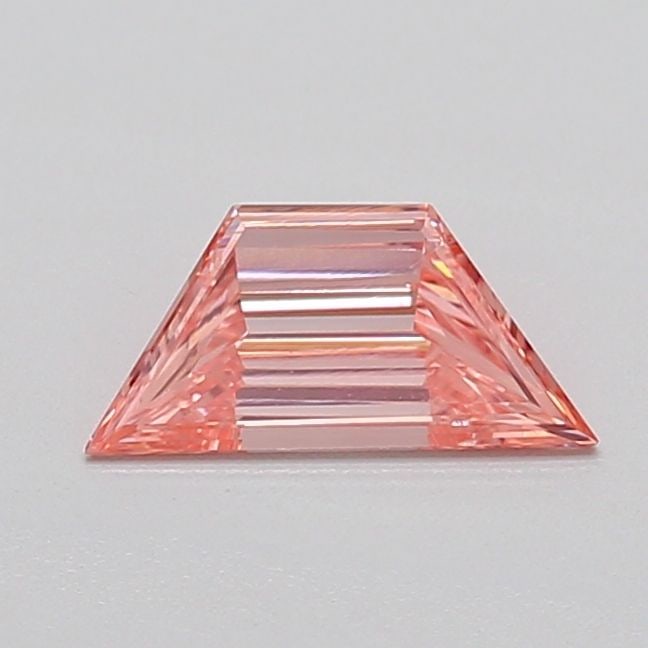 Loose Diamond - TRAPEZOID 0.4ct Fancy Vivid Pink VS2: Loose Diamond - TRAPEZOID 0.4ct Fancy Vivid Pink VS2 Source: This is a real non-mined Diamond that has been grown in a lab Shape: TRAPEZOID Carats: 0.4 Color: Fancy Vivid Pink Certification: IGI Video
