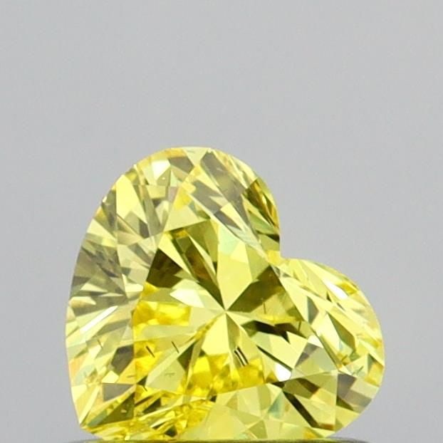 Loose Diamond - HEART 0.53ct Fancy Vivid Yellow SI1: Loose Diamond - HEART 0.53ct Fancy Vivid Yellow SI1 Source: This is a real non-mined Diamond that has been grown in a lab Shape: HEART Carats: 0.53 Color: Fancy Vivid Yellow Certification: IGI Video: