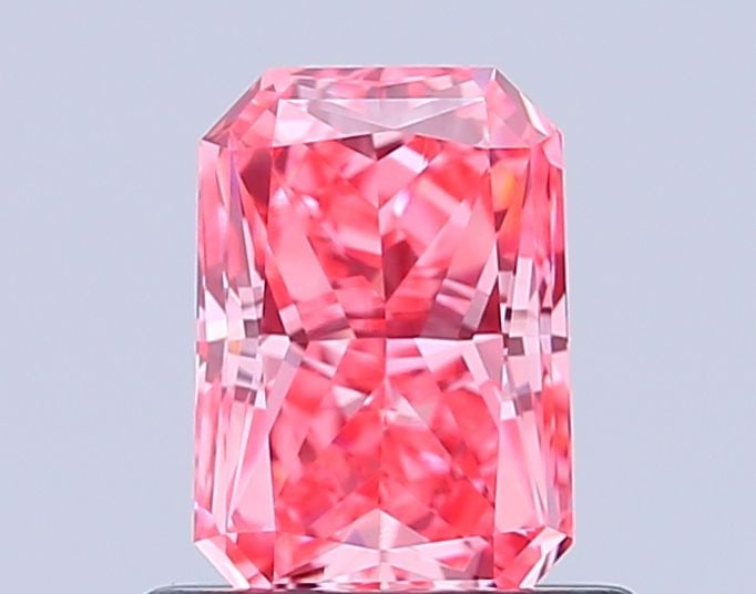 Loose Diamond - RADIANT 0.81ct Fancy Vivid Pink VS1: Loose Diamond - RADIANT 0.81ct Fancy Vivid Pink VS1 Source: This is a real non-mined Diamond that has been grown in a lab Shape: RADIANT Carats: 0.81 Color: Fancy Vivid Pink Certification: IGI Video: