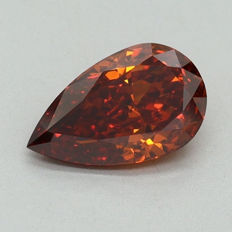 Loose Diamond - PEAR 1.0ct Fancy Vivid Orange VS2: Loose Diamond - PEAR 1.0ct Fancy Vivid Orange VS2 Source: This is a real non-mined Diamond that has been grown in a lab Shape: PEAR Carats: 1.0 Color: Fancy Vivid Orange Certification: IGI Video: