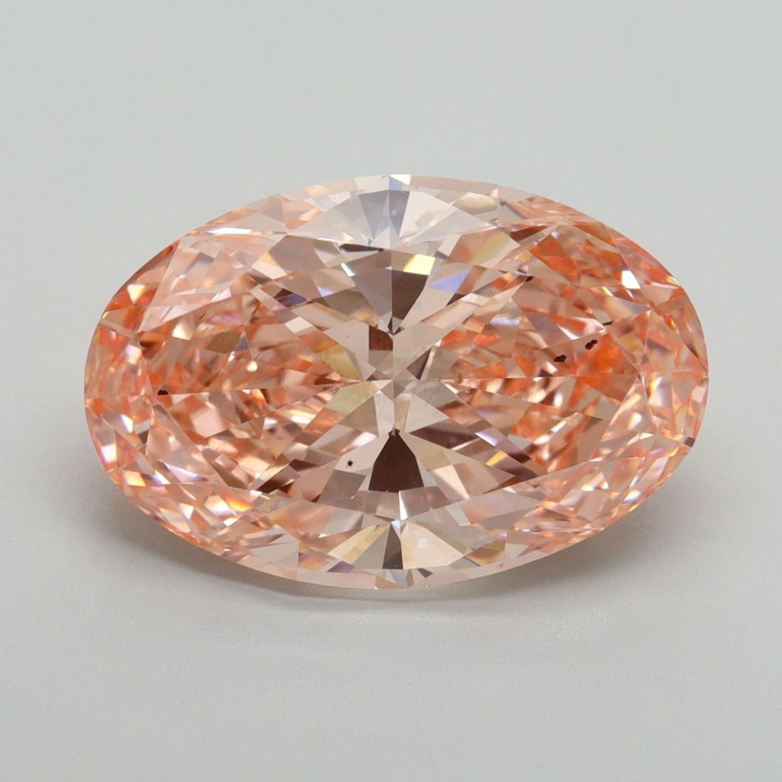 Loose Diamond - OVAL 7.26ct Fancy Vivid Pink VS2: Loose Diamond - OVAL 7.26ct Fancy Vivid Pink VS2 Source: This is a real non-mined Diamond that has been grown in a lab Shape: OVAL Carats: 7.26 Color: Fancy Vivid Pink Certification: IGI Video:
