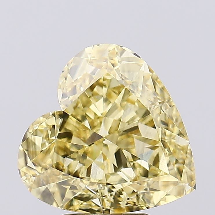 Loose Diamond - HEART 6.01ct Fancy Intense Yellow VS2: Loose Diamond - HEART 6.01ct Fancy Intense Yellow VS2 Source: This is a real non-mined Diamond that has been grown in a lab Shape: HEART Carats: 6.01 Color: Fancy Intense Yellow Certification: IGI Vid