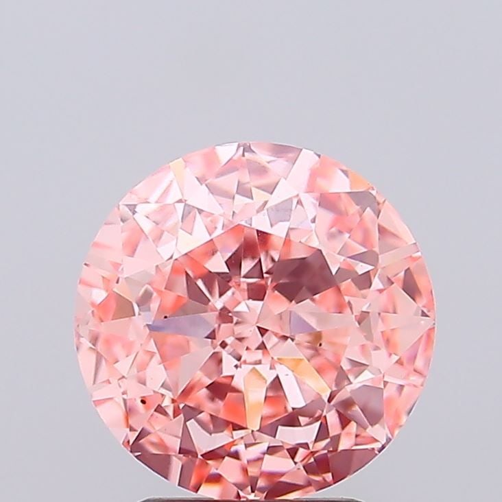 Loose Diamond - ROUND 3.02ct Fancy Vivid Pink VS2: Loose Diamond - ROUND 3.02ct Fancy Vivid Pink VS2 Source: This is a real non-mined Diamond that has been grown in a lab Shape: ROUND Carats: 3.02 Color: Fancy Vivid Pink Certification: IGI Video: