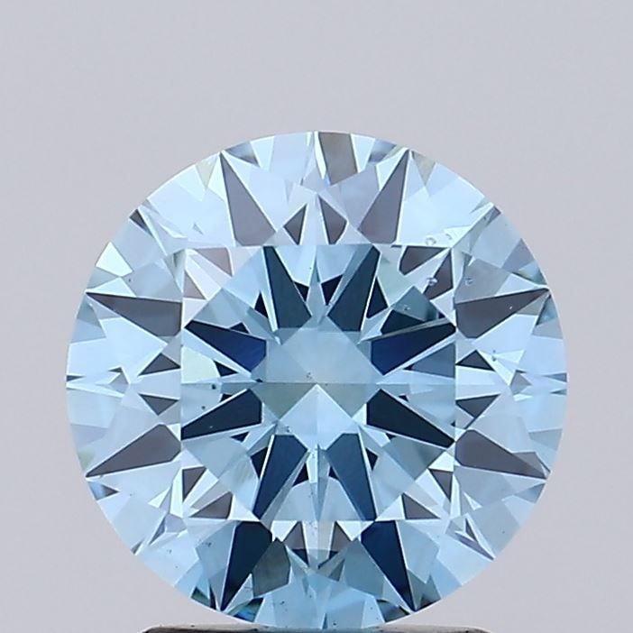 Ideal Loose Diamond - ROUND 2.17ct Fancy Vivid Blue VS2: Ideal Loose Diamond - ROUND 2.17ct Fancy Vivid Blue VS2 Source: This is a real non-mined Diamond that has been grown in a lab Shape: ROUND Carats: 2.17 Color: Fancy Vivid Blue Certification: IGI Video