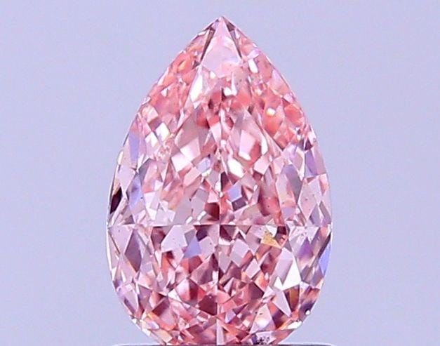 Loose Diamond - PEAR 1.08ct Fancy Vivid Pink VS2: Loose Diamond - PEAR 1.08ct Fancy Vivid Pink VS2 Source: This is a real non-mined Diamond that has been grown in a lab Shape: PEAR Carats: 1.08 Color: Fancy Vivid Pink Certification: IGI Video: