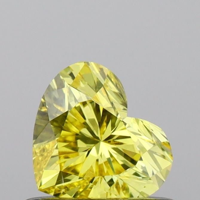 Loose Diamond - HEART 0.47ct Fancy Vivid Yellow SI1: Loose Diamond - HEART 0.47ct Fancy Vivid Yellow SI1 Source: This is a real non-mined Diamond that has been grown in a lab Shape: HEART Carats: 0.47 Color: Fancy Vivid Yellow Certification: IGI Video: