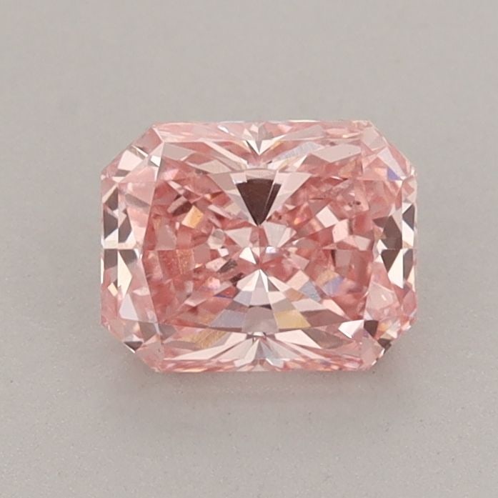 Loose Diamond - RADIANT 0.9ct Fancy Vivid Pink VS1: Loose Diamond - RADIANT 0.9ct Fancy Vivid Pink VS1 Source: This is a real non-mined Diamond that has been grown in a lab Shape: RADIANT Carats: 0.9 Color: Fancy Vivid Pink Certification: IGI Video: