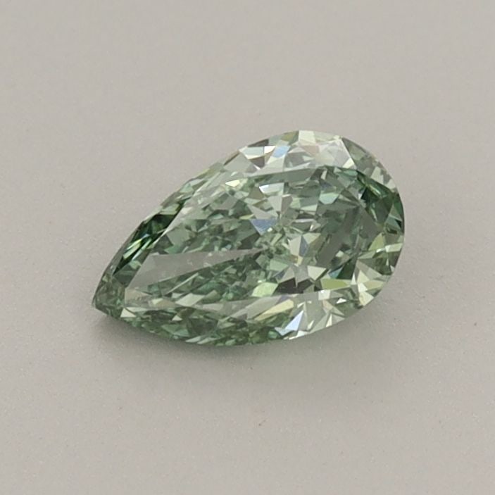 Loose Diamond - PEAR 0.42ct Fancy Vivid Green VVS2: Loose Diamond - PEAR 0.42ct Fancy Vivid Green VVS2 Source: This is a real non-mined Diamond that has been grown in a lab Shape: PEAR Carats: 0.42 Color: Fancy Vivid Green Certification: IGI Video: