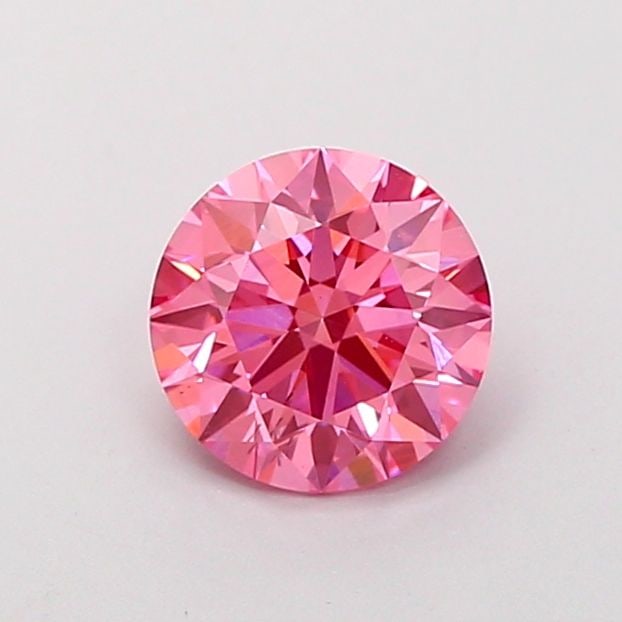 Ideal Loose Diamond - ROUND 1.35ct Fancy Vivid Pink VS2: Ideal Loose Diamond - ROUND 1.35ct Fancy Vivid Pink VS2 Source: This is a real non-mined Diamond that has been grown in a lab Shape: ROUND Carats: 1.35 Color: Fancy Vivid Pink Certification: IGI Video