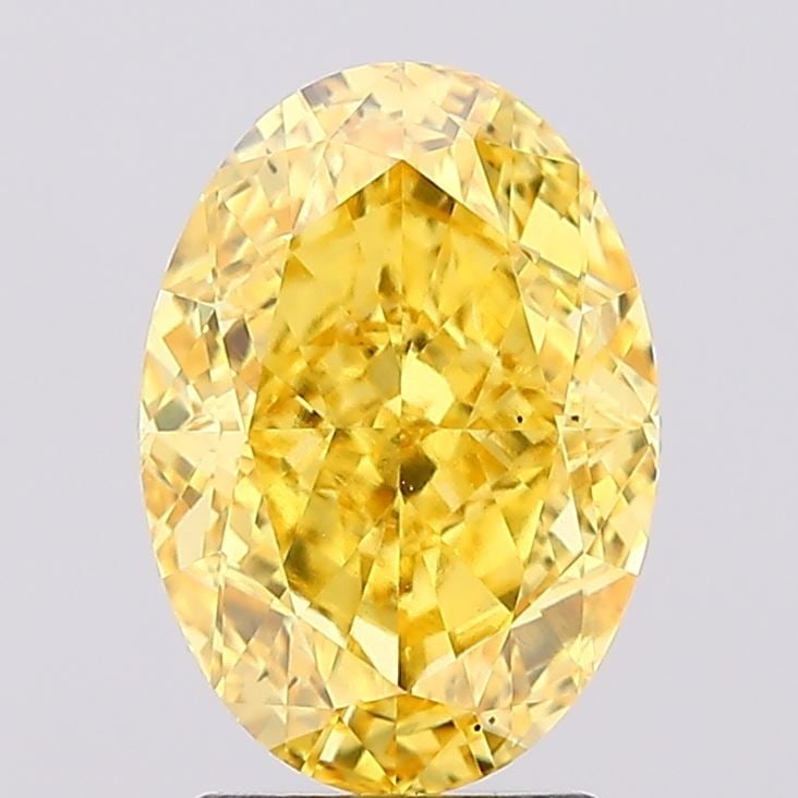 Loose Diamond - OVAL 2.81ct Fancy Vivid Yellow VS2: Loose Diamond - OVAL 2.81ct Fancy Vivid Yellow VS2 Source: This is a real non-mined Diamond that has been grown in a lab Shape: OVAL Carats: 2.81 Color: Fancy Vivid Yellow Certification: IGI Video:
