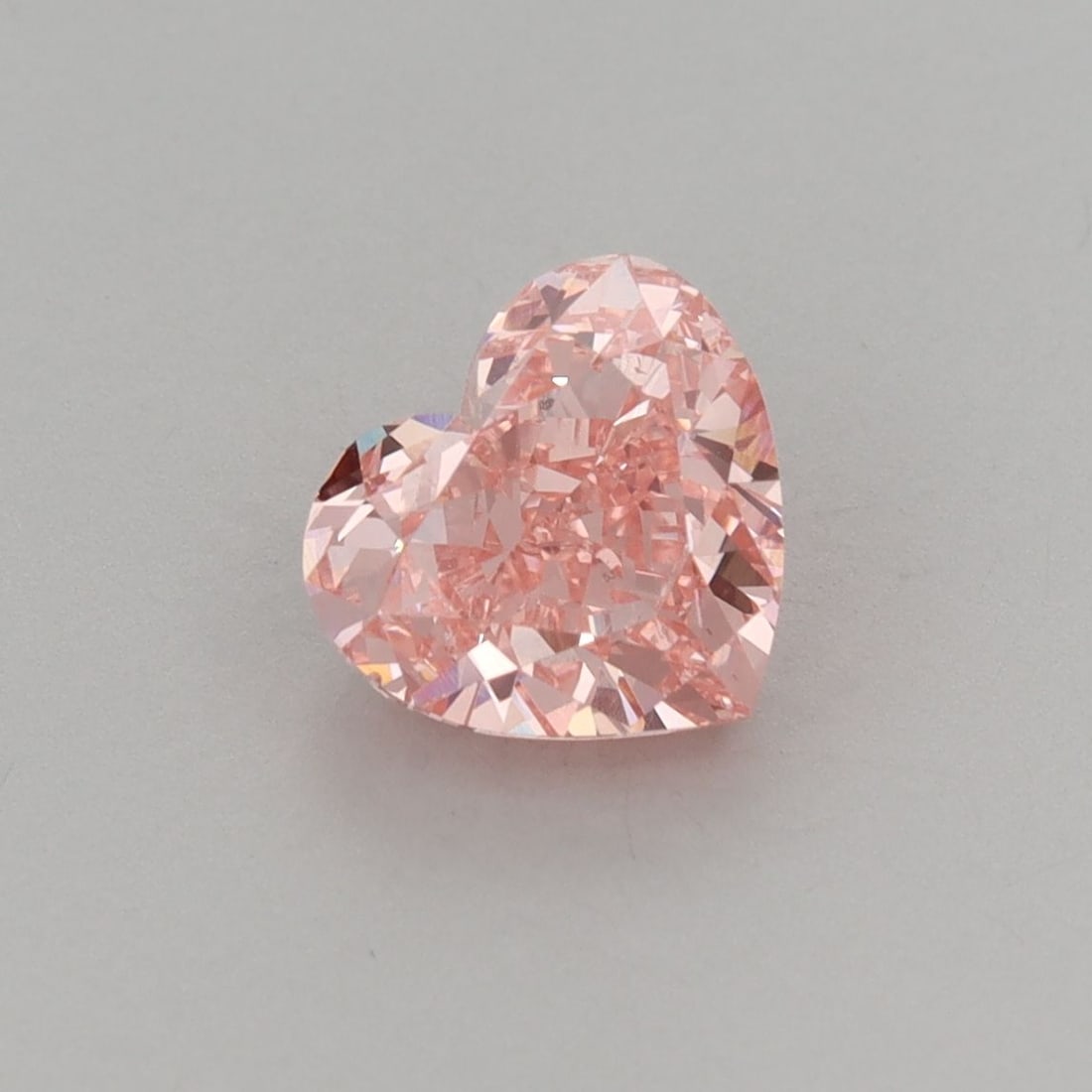 Loose Diamond - HEART 1.67ct Fancy Vivid Pink VS1: Loose Diamond - HEART 1.67ct Fancy Vivid Pink VS1 Source: This is a real non-mined Diamond that has been grown in a lab Shape: HEART Carats: 1.67 Color: Fancy Vivid Pink Certification: IGI Video: