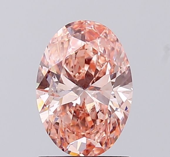 Loose Diamond - OVAL 1.0ct Fancy Vivid Pink SI2: Loose Diamond - OVAL 1.0ct Fancy Vivid Pink SI2 Source: This is a real non-mined Diamond that has been grown in a lab Shape: OVAL Carats: 1.0 Color: Fancy Vivid Pink Certification: IGI Video: