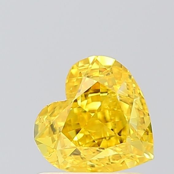 Loose Diamond - HEART 1.0ct Fancy Vivid Yellow VS2: Loose Diamond - HEART 1.0ct Fancy Vivid Yellow VS2 Source: This is a real non-mined Diamond that has been grown in a lab Shape: HEART Carats: 1.0 Color: Fancy Vivid Yellow Certification: IGI Video: