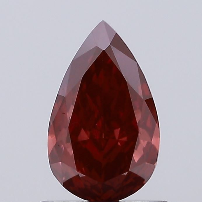 Loose Diamond - PEAR 0.84ct Fancy Vivid Red VS2: Loose Diamond - PEAR 0.84ct Fancy Vivid Red VS2 Source: This is a real non-mined Diamond that has been grown in a lab Shape: PEAR Carats: 0.84 Color: Fancy Vivid Red Certification: NONE Video: