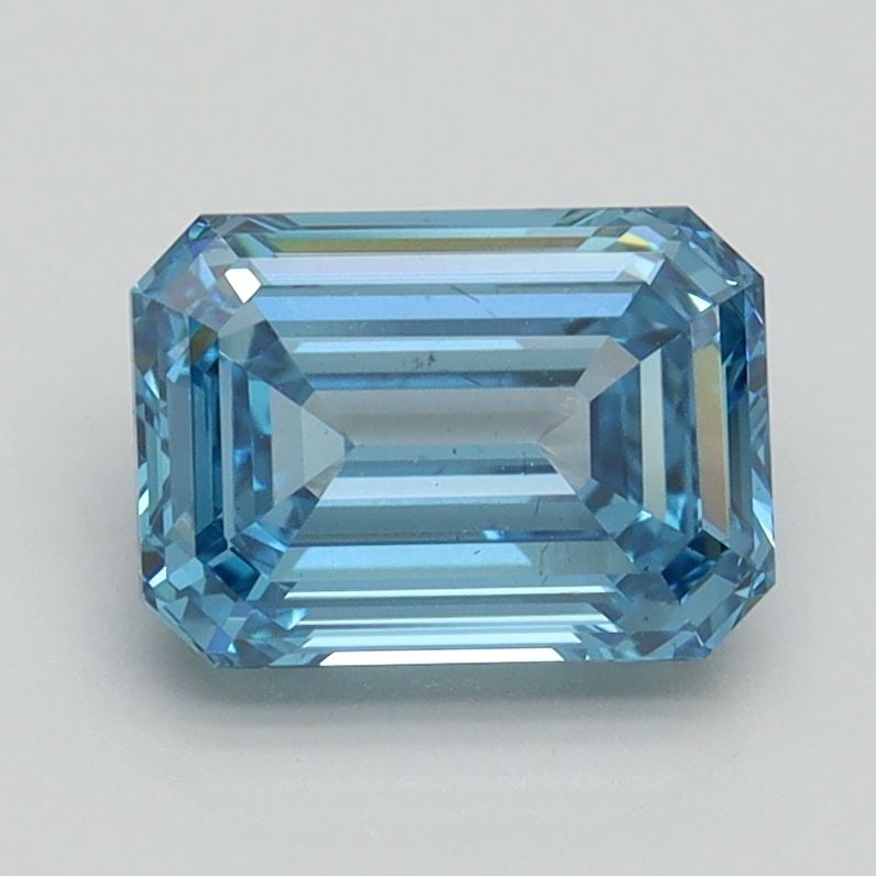 Loose Diamond - EMERALD 1.55ct Fancy Vivid Blue VS2: Loose Diamond - EMERALD 1.55ct Fancy Vivid Blue VS2 Source: This is a real non-mined Diamond that has been grown in a lab Shape: EMERALD Carats: 1.55 Color: Fancy Vivid Blue Certification: IGI Video:
