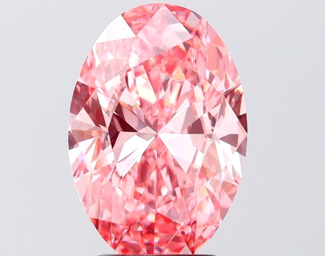 Loose Diamond - OVAL 3.56ct Fancy Vivid Pink VS1: Loose Diamond - OVAL 3.56ct Fancy Vivid Pink VS1 Source: This is a real non-mined Diamond that has been grown in a lab Shape: OVAL Carats: 3.56 Color: Fancy Vivid Pink Certification: IGI Video: