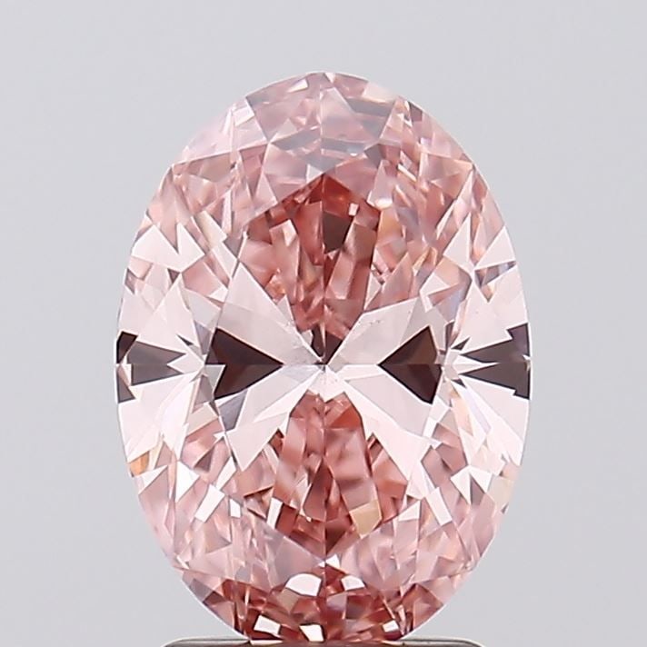 Loose Diamond - OVAL 2.07ct Fancy Vivid Pink VS1: Loose Diamond - OVAL 2.07ct Fancy Vivid Pink VS1 Source: This is a real non-mined Diamond that has been grown in a lab Shape: OVAL Carats: 2.07 Color: Fancy Vivid Pink Certification: IGI Video: