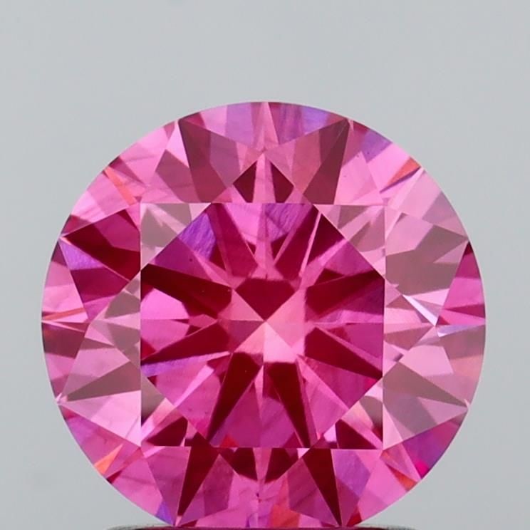 Loose Diamond - ROUND 1.51ct Fancy Vivid Pink VS2: Loose Diamond - ROUND 1.51ct Fancy Vivid Pink VS2 Source: This is a real non-mined Diamond that has been grown in a lab Shape: ROUND Carats: 1.51 Color: Fancy Vivid Pink Certification: IGI Video: