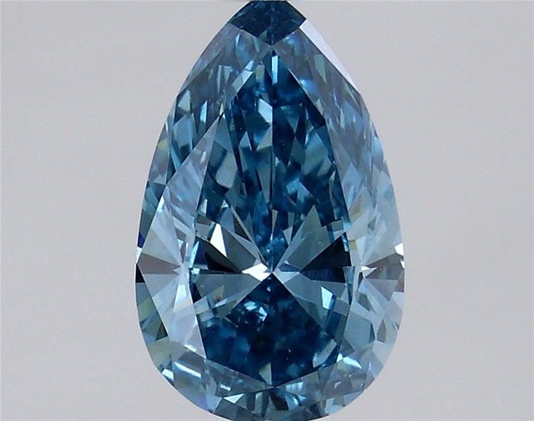 Loose Diamond - PEAR 0.95ct Fancy Vivid Blue VS1: Loose Diamond - PEAR 0.95ct Fancy Vivid Blue VS1 Source: This is a real non-mined Diamond that has been grown in a lab Shape: PEAR Carats: 0.95 Color: Fancy Vivid Blue Certification: IGI Video:
